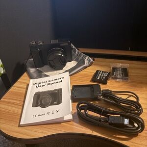 Digital Camera Starter Bundle – Zoom Lens, Extra Battery, Charger, Pouch